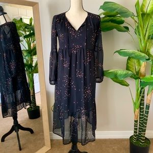 Black flowy dress with pink stars